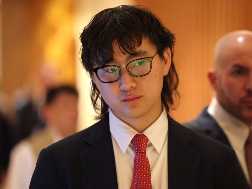 Alexandr Wang 在新德里 AI Impact Summit 现场（2026 年 2 月 19 日）的照片。