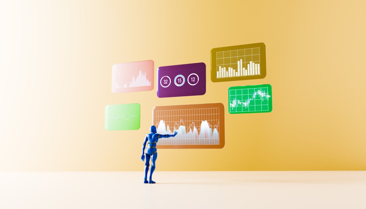 蓝色人形机器人伸手触碰悬浮的数据图表面板，TechCrunch 报道本轮融资时使用的配图（图片来源：Getty Images）