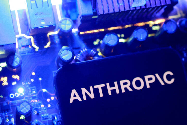 路透社插图：印有 ANTHROPIC 字样的设备，背景为蓝色电路板